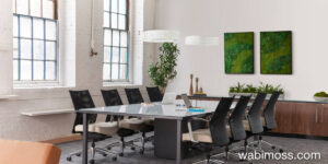 Board room in an office with two moss artwork